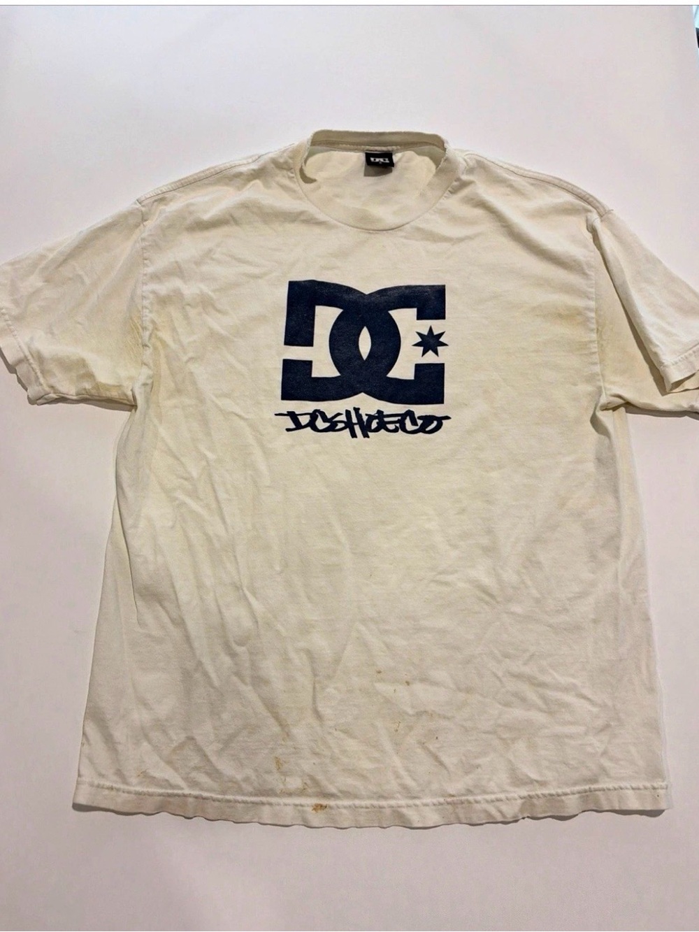DC Men’s Cream T‑Shirt with Navy Logo